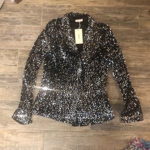 A . Peach sequin shirt/jacket.